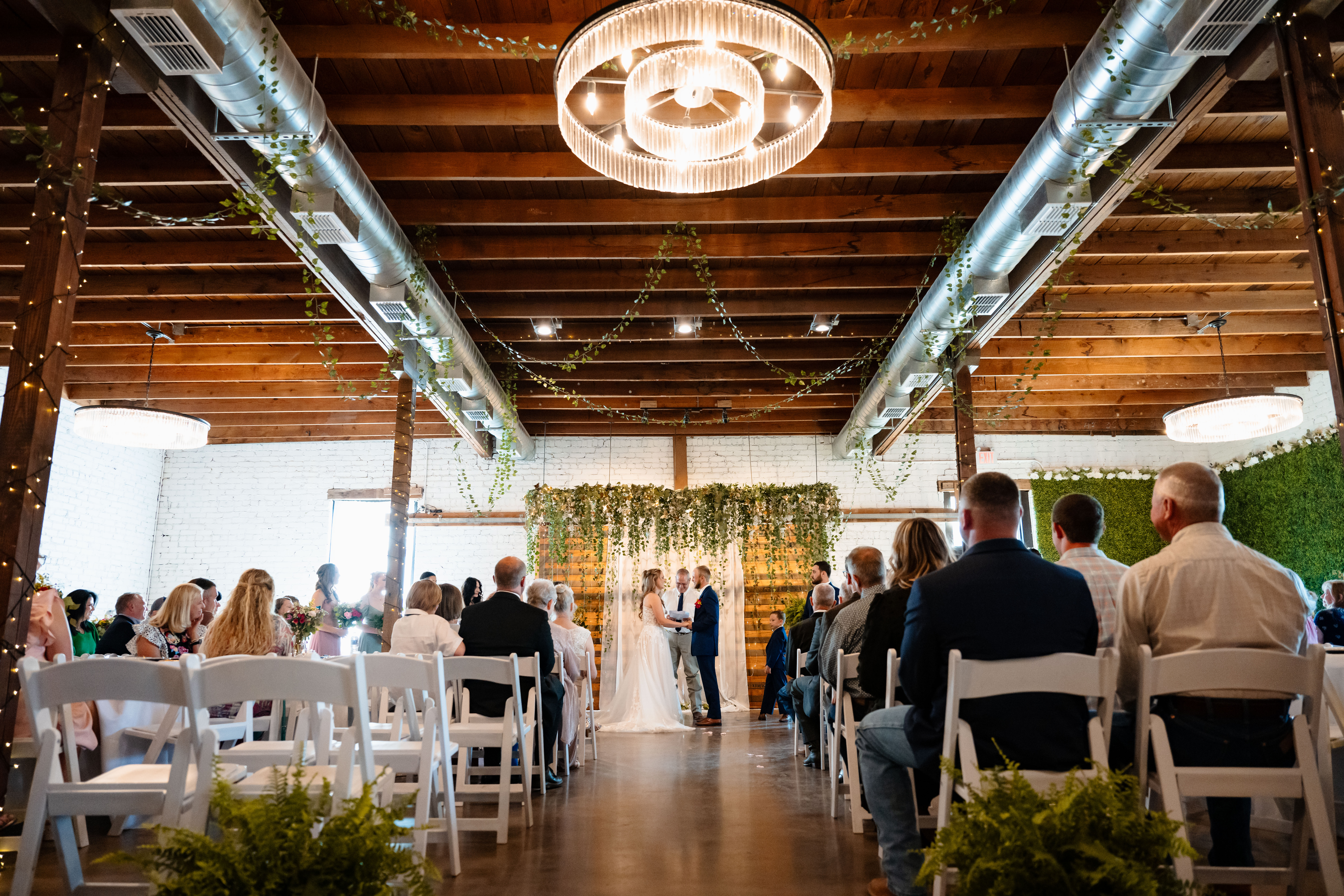 preston and kayla abilene wedding looking down the iasle