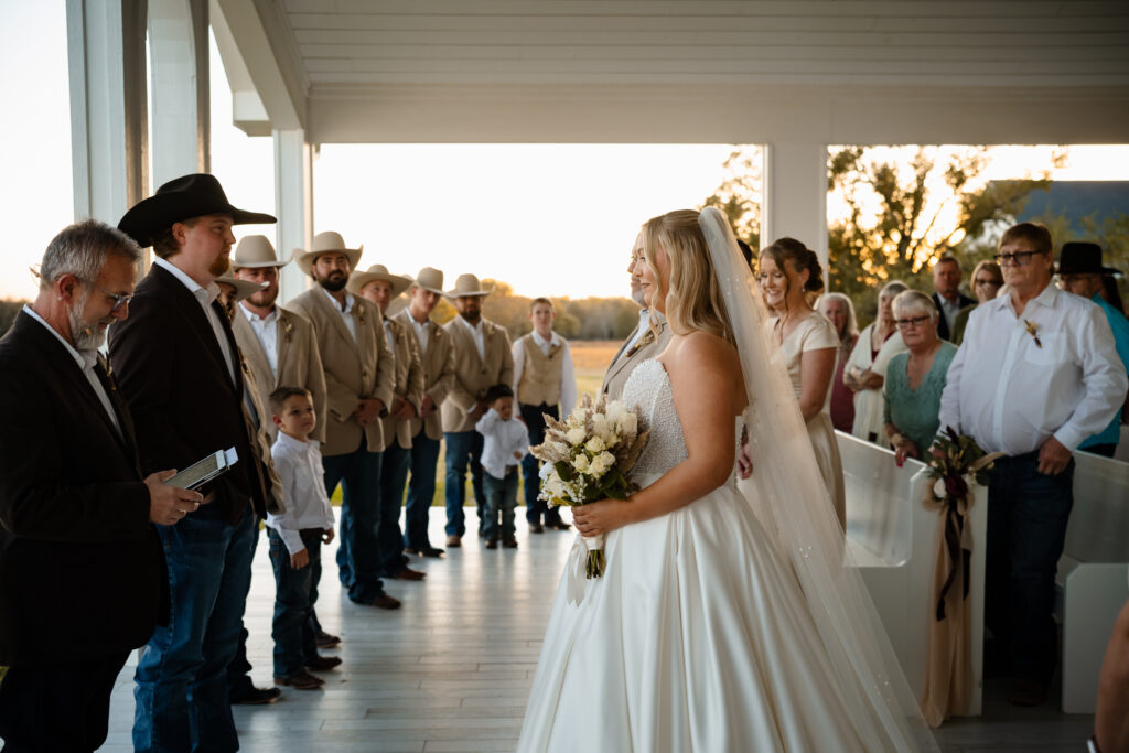 Bride and groom first look outside Chandelier Farm chapel
