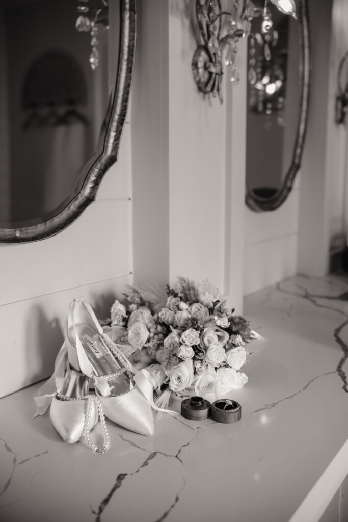detail picture of brides details in bridal suite at chandlier farm