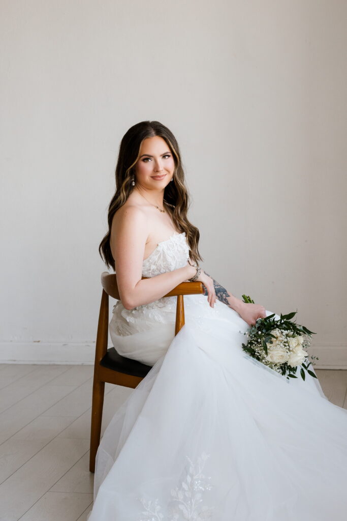 bride soft smiles during her bridal session with shelly voss